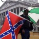 Stanley Lott, of Saluda, South Carolina, joins other Confederate flag supporters as they counteract a protest by members of the NAACP calling for the removal of the flag from the grounds of the statehouse January 21, 2002 in Columbia, SC. (Photo by Todd Bennett/Getty Images)