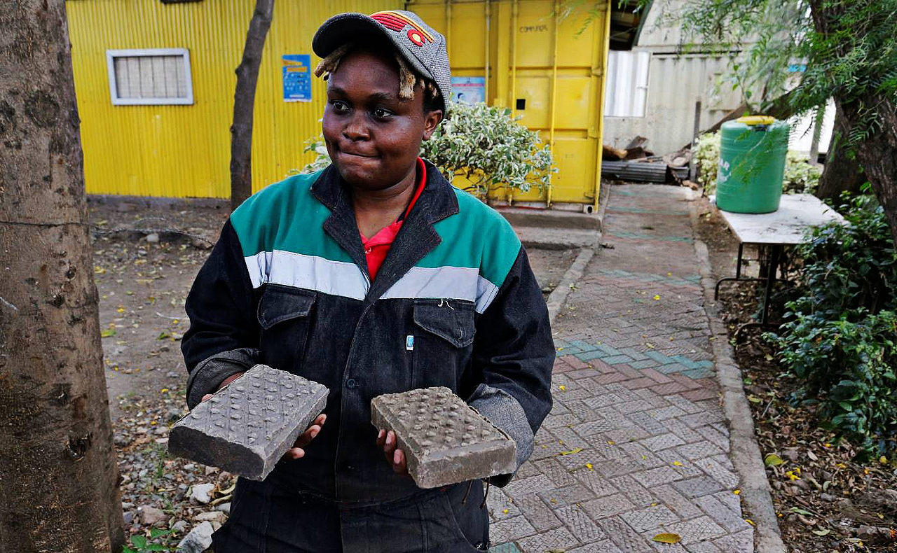 Kenyan recycles plastic waste into bricks stronger than concrete