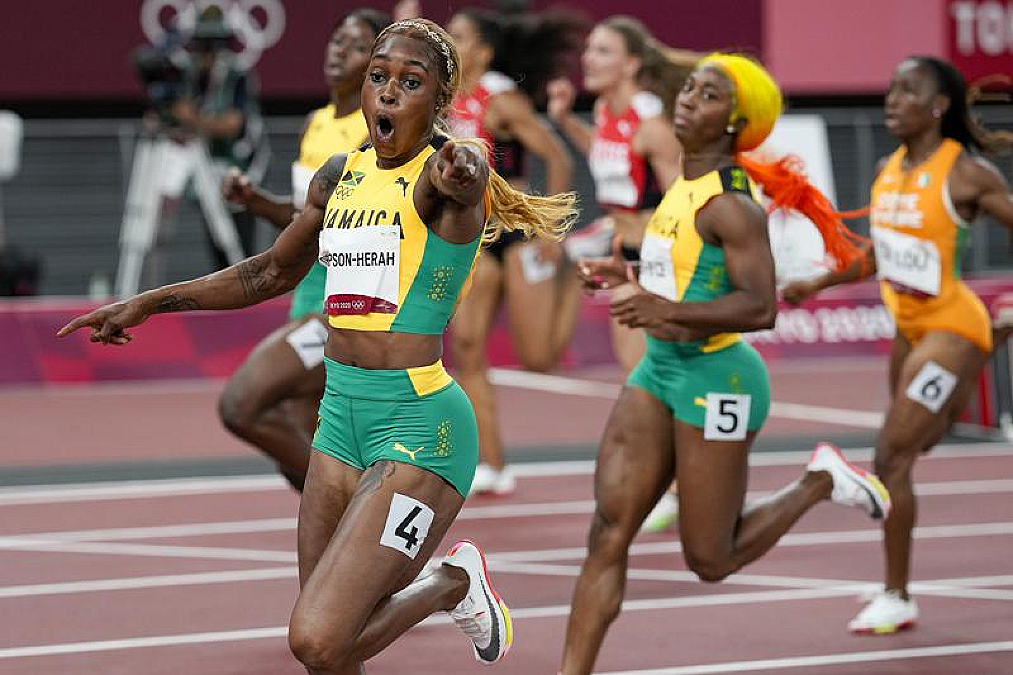 Jamaica's Elaine Thompson-Herah breaks Flo Jo’s Olympic record in women’s 100 meters