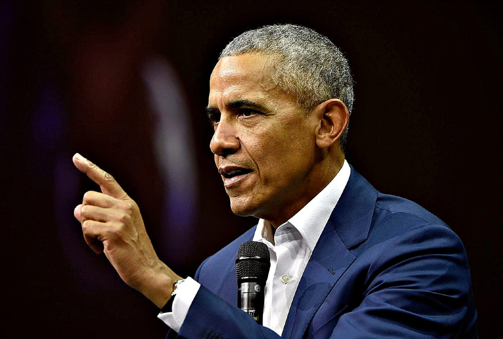 Obama returns to the White House to celebrate health law
