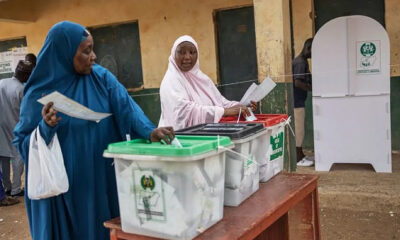 Nigerians vote for new president in tight election race