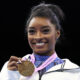 Gymnastics star Simone Biles named AP Female Athlete of the Year a third time after dazzling return
