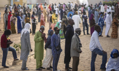 Senegal votes in a tightly contested presidential race after months of unrest