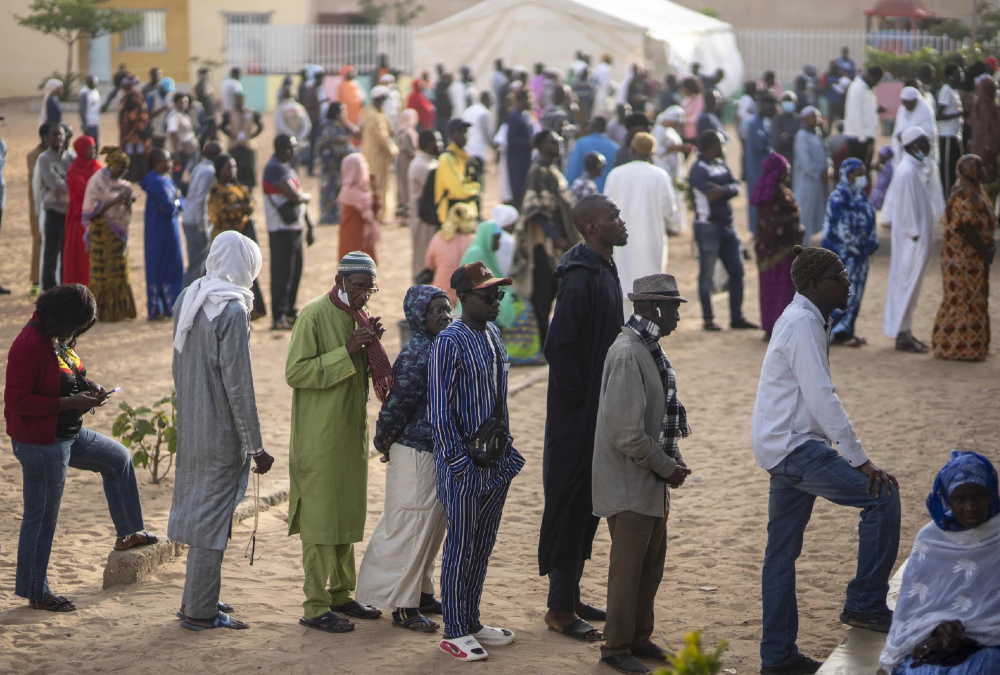 Senegal votes in a tightly contested presidential race after months of unrest