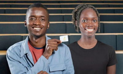 Ugandan entrepreneurs Samuel Muyita and Sandra Namboozo display plant-based Karpolax sachets used to extend fruit shelf life and reduce food waste.