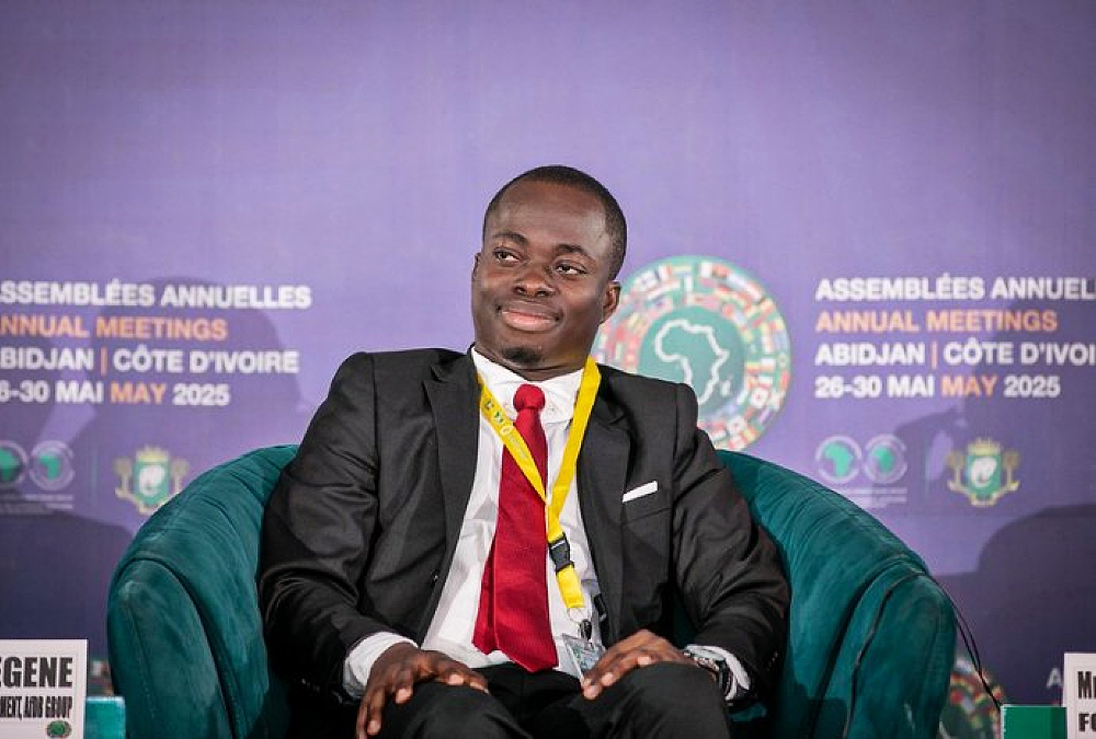 Ivorian entrepreneur Koffi Amani François Xavier speaking at the AfDB 2025 Annual Meetings, sharing how he grew his snack brand “Mon Chips” into a multinational business with support from the ENABLE Youth and AgriPitch programs.