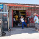 South African township spaza shop representing micro-enterprises supported by government funding amid calls for broader entrepreneurship reform