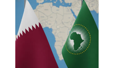 Qatar flag and African Union emblem side by side with Africa map in background, symbolizing Qatar's growing diplomatic role in mediating African conflicts such as the DR Congo-M23 ceasefire and regional peace efforts in the Great Lakes.