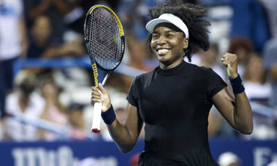 Venus Williams celebrates her singles victory at the 2024 DC Open, becoming the oldest WTA match winner in over 20 years.