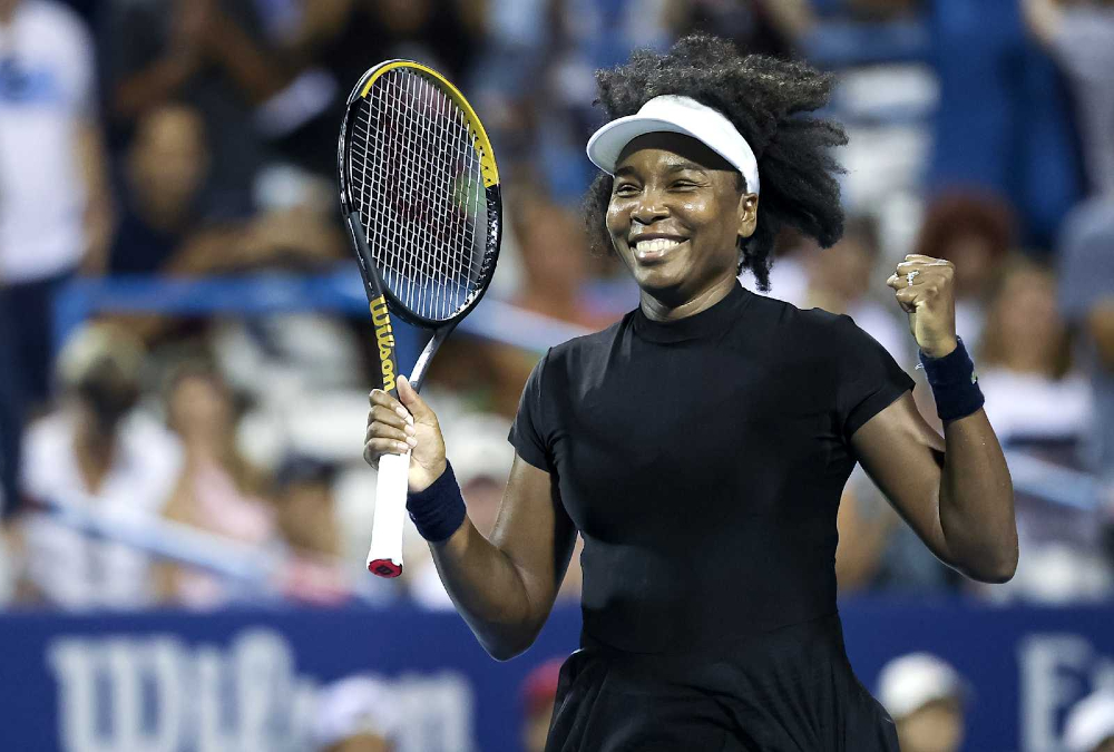 Venus Williams celebrates her singles victory at the 2024 DC Open, becoming the oldest WTA match winner in over 20 years.