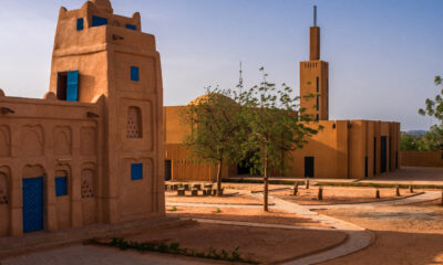 Traditional African architecture and community life reflecting sustainable living and cultural resilience.