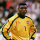 Portrait of Peter Rufai, legendary Nigerian goalkeeper and 1994 AFCON champion, remembered for his impact on African and European football.