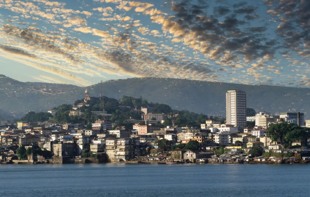 Aerial view of Freetown, Sierra Leone, showcasing coastal infrastructure and urban development symbolizing the country’s growing investment potential in West Africa.