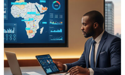 A professional business leader reviewing investment data on Africa's growing markets, with a map of Africa highlighted in the background