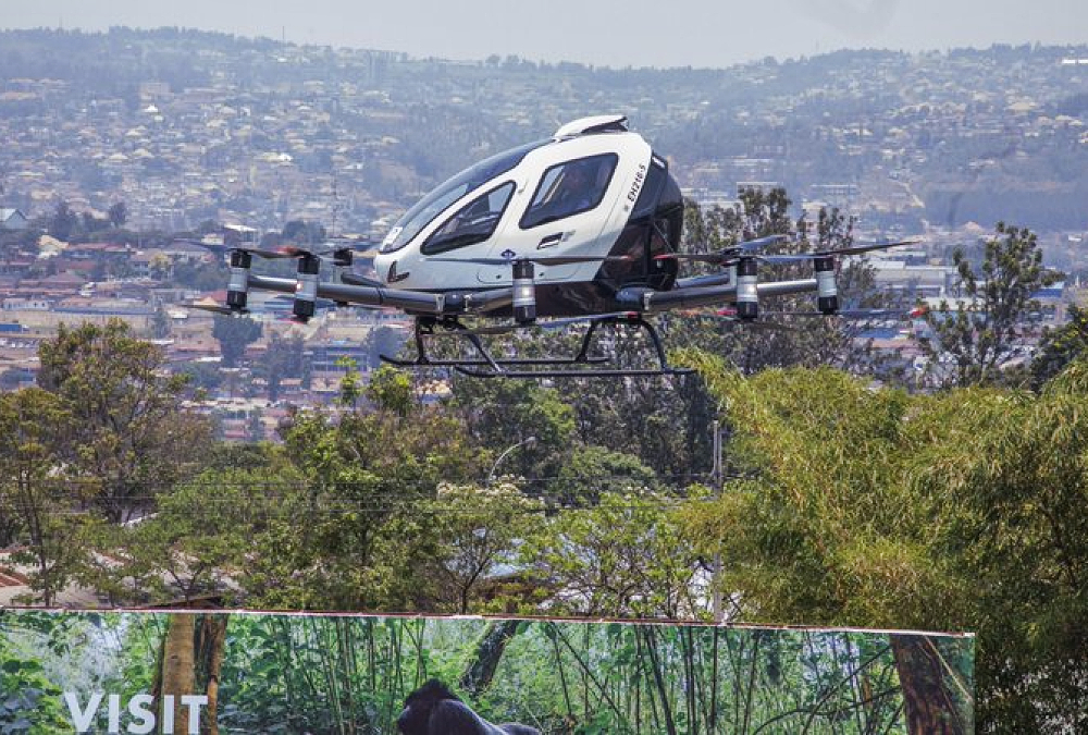 EHang EH216-S self-flying electric air taxi flying above Kigali, Rwanda during Africa’s first autonomous passenger flight.