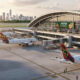 African air travel infrastructure showing airplanes at a modern airport, symbolizing the push for affordable flights, open skies, and regional connectivity under AfCFTA.