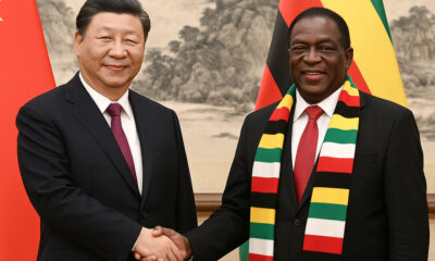 Xi Jinping and Zimbabwean President discussing historical ties and resource diplomacy in Africa