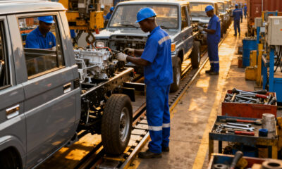 Factory workers in Nigeria assembling vehicles for regional export - AfCFTA industrialization opportunity
