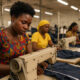 African textile factory workers assembling clothing for export to the United States under AGOA, supporting jobs and economic growth in Sub-Saharan Africa through preferential trade access.