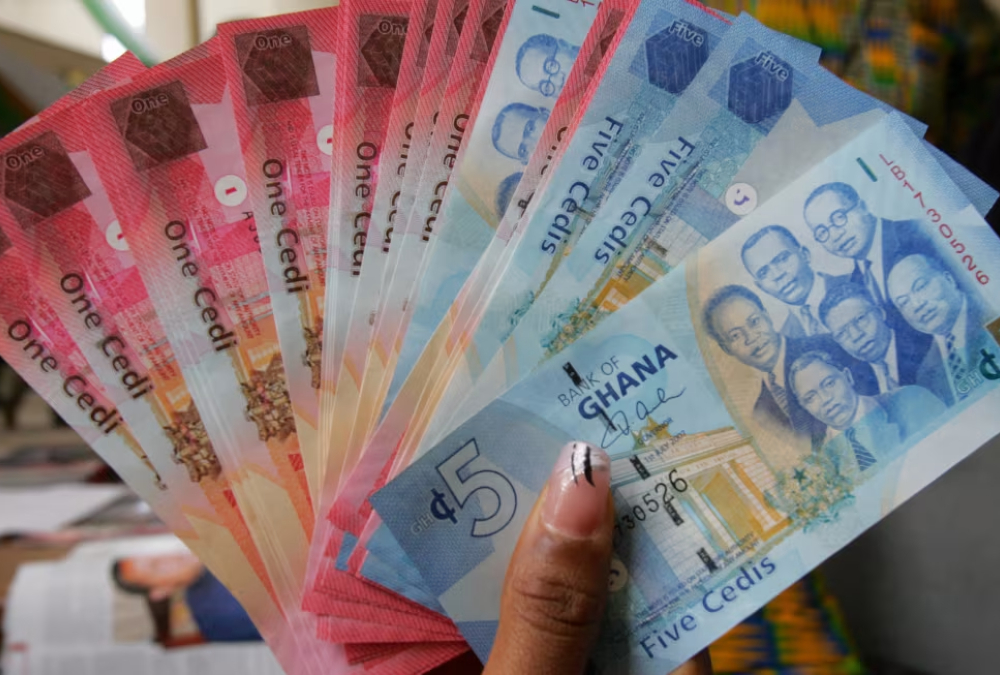Ghana cedi banknotes displayed during the Cedi@60 anniversary launch event in Accra, celebrating 60 years of national currency and monetary sovereignty.