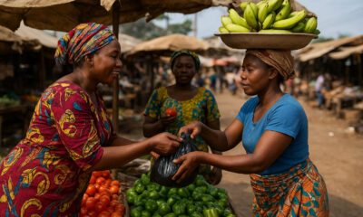 Women informal cross-border traders navigating customs at an African border checkpoint—highlighting their critical role in regional trade and the challenges of informality.