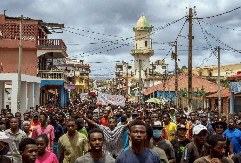 Young activists in Antananarivo, Madagascar, marching under the #GenZMada banner calling for President Rajoelina’s resignation and systemic change.
