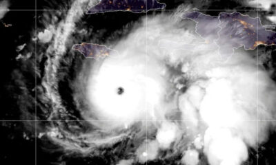 Satellite image of Hurricane Melissa, a powerful Category 5 storm, approaching Jamaica in October 2025 with swirling clouds and a defined eye.
