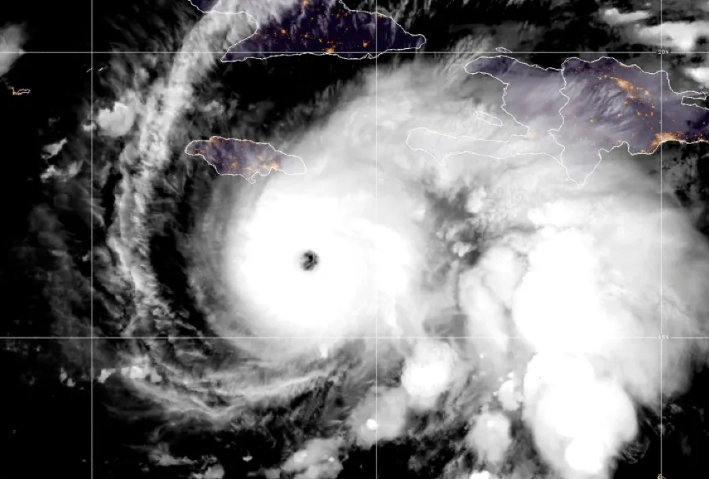 Satellite image of Hurricane Melissa, a powerful Category 5 storm, approaching Jamaica in October 2025 with swirling clouds and a defined eye.