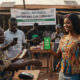A mobile money transaction in Africa, highlighting increased digital payments, and financial inclusion