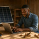 A young African entrepreneur works in a sunlit workshop powered by solar panels, symbolizing how reliable electricity access drives job creation and economic opportunity across the continent.