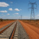 A new transnational railway or power line, representing the continental infrastructure needed to support African unity.