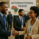 Business professional networking at an international trade event in Africa, symbolizing the intersection of randomness and readiness that drives export success across African markets.