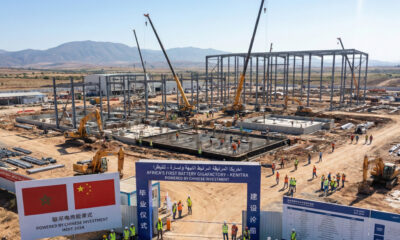 Construction site of Africa's first battery gigafactory in Kenitra, Morocco, symbolizing the continent's strategic shift from raw mineral exports to green manufacturing and participation in the global EV supply chain.