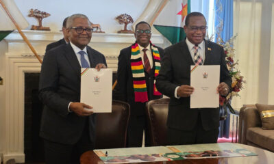 Aliko Dangote signing $1 billion investment deal in Zimbabwe for cement manufacturing, coal mining, and power generation to support industrial growth.