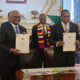 Aliko Dangote signing $1 billion investment deal in Zimbabwe for cement manufacturing, coal mining, and power generation to support industrial growth.