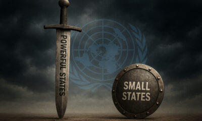 Symbolic representation of global sovereignty inequality: a large sword labeled "Powerful States" towering over a small, resilient shield marked "Small States," set against a backdrop of the United Nations and storm clouds representing climate and economic vulnerability.