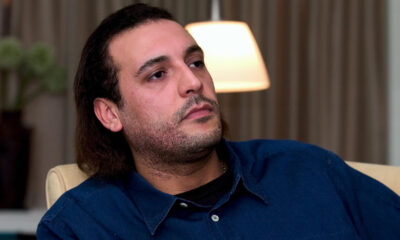 Hannibal Gaddafi leaving Lebanese prison after nearly 10 years detention related to Moussa al-Sadr disappearance, symbolizing unresolved Lebanon-Libya political tensions.