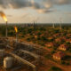Please generate a realistic image of dimensions 1536 by 1024 from the following theme: African oil and gas infrastructure powering homes, industries, and renewable energy transition across the continent.