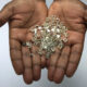 Botswana and Angola officials discuss joint acquisition of De Beers, the world’s largest diamond mining company, signaling a shift in global diamond industry ownership.