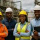Young African energy workers and engineers at oil and gas facility