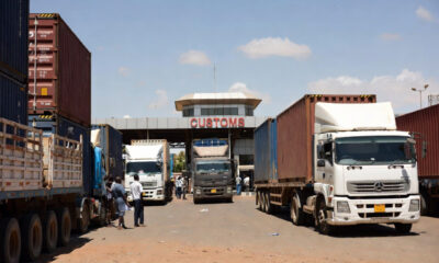 Trucks and cargo at West African border crossing illustrating regional trade.