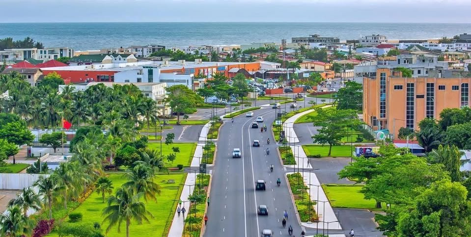 Avenue in Cotonou, Benin. The city has been noted for its significant infrastructure projects and organized environment.