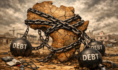 Illustration of Africa weighed down by heavy debt chains, symbolizing how rising sovereign debt blocks development, infrastructure investment, and social services across the continent.