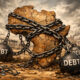 Illustration of Africa weighed down by heavy debt chains, symbolizing how rising sovereign debt blocks development, infrastructure investment, and social services across the continent.