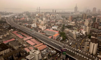 The bustling skyline of Lagos, symbolizing the dynamic economic energy of Africa's modern, rapidly growing megacities.