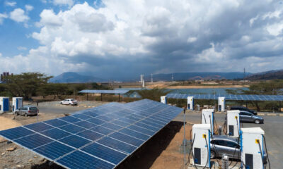 Ethiopia's electric vehicle charging station powered by renewable hydropower and solar energy, symbolizing the nation's transition away from fossil fuel imports.