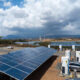 Ethiopia's electric vehicle charging station powered by renewable hydropower and solar energy, symbolizing the nation's transition away from fossil fuel imports.