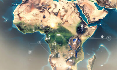 A conceptual illustration of a map of Africa overlaid with interconnected digital and industrial infrastructure, representing sovereign system building.