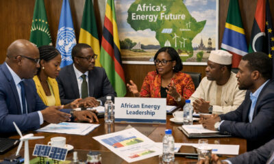 African energy professionals discussing policy and leadership around a conference table, symbolizing the call for African inclusion in global energy decision-making and the continent’s energy future.