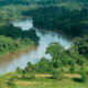 Aerial view of the Congo River flowing through dense rainforest in the Democratic Republic of Congo